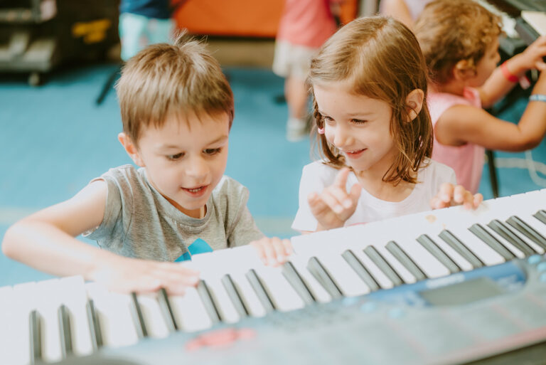 kids playing with piano